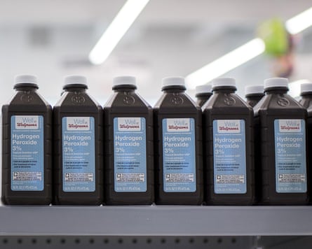 bottles of hydrogen peroxide on a shelf at walgreens