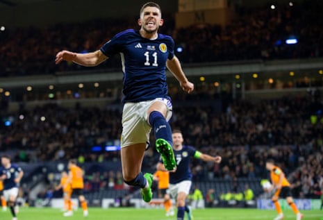 Ryan Christie celebrates after his penalty put Scotland 2-1 ahead.