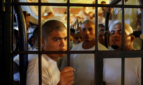 Members of the MS-13 gang wait in their cell at Chalatenango prison in El Salvador.