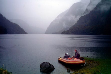 Ken Tustin’s wife, Marg, in a boat in Dusky Sound, Fiordland, during one of the couple’s many moose tracking trips.