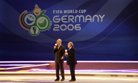 Franz Beckenbauer, president of the 2006 World Cup organising committee, stands with Sepp Blatter at the draw for the finals. 
