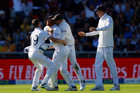 Jonny Bairstow is mobbed after catching out Mitchell Marsh.