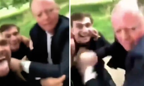 Chris Whitty being accosted by two men in a park