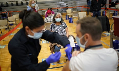 People receive the Covid-19 vaccine at a vaccination site in Las Vegas in February.