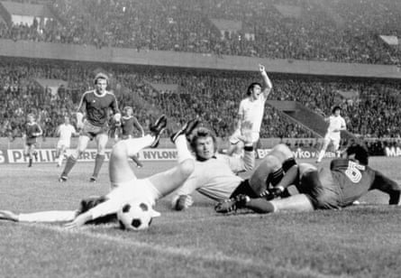 Bayern Munich goalkeeper Sepp Maier (centre) looks hopefully at the ball after colliding with Leeds United’s Allan Clarke (left) in 1975.