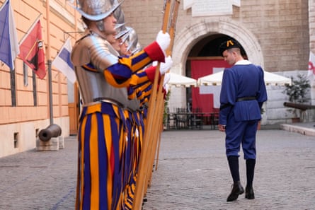 The Vatican Swiss Guards are inspected by their instructor during a rehearsal for the swearing-in ceremony at the Vatican.