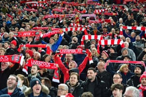 Liverpool fans sing in the stands ahead of kick-off.