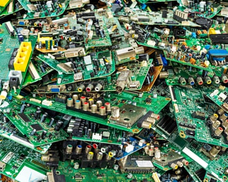 Pile of electronic waste from computer motherboards old TV circuit boards from the recycling industry
