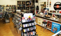 Interior of Recordbag, a music shop in Vienna. The photo shows displays of books, vinyl and CDs.