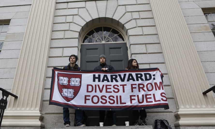 Students protest at Harvard to demand divesting from fossil fuels.