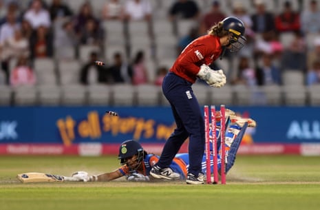 Amanjot Kaur of India is tally retired by Amy Jones of England.