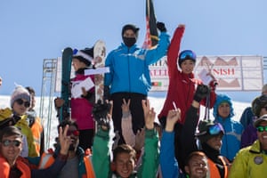 Nazira, who came first, stands triumphant on the podium after the women’s race of the Afghan Ski Challenge.