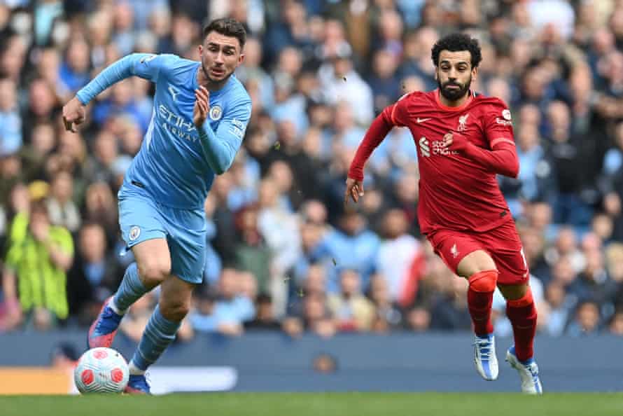 The form of Aymeric Laporte (left), who is fighting here with Mohamed Salah, has paid off Pep Guardiola’s faith in the defender.