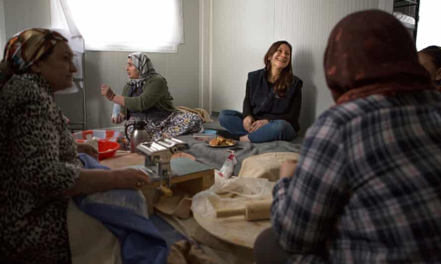 Writer Dina Nayeri (third from left) with women at Katsikas refugee camp in Greece