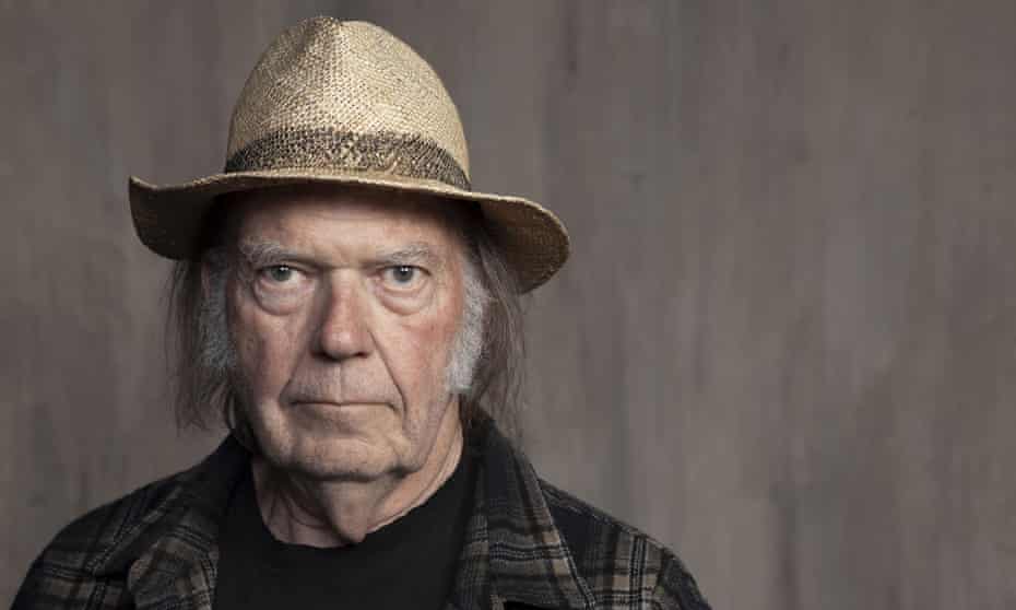 Neil Young demands Spotify remove his music over Joe Rogan vaccine  misinformation | Neil Young | The Guardian