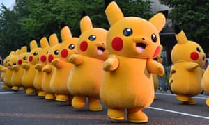 A line of Pokémon Pikachu characters parade in Yokohama, Japan.