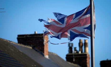 A bedraggled union flag flies over houses in Hartlepool on the third anniversary of Brexit.