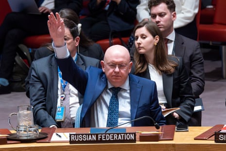 Russian Permanent Representative to the UN Vassily Nebenzia raises his hand to veto the Non-proliferation of nuclear weapons resolution bill during a meeting of UN Security Council members
