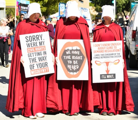 Three women’s rights campaigners dressed as characters from The Handmaid’s Tale at a Women’s March in Los Angeles, California, on January 19 2019