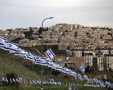 Israeli flags along the road at Ramat Shlomo, a Jewish settlement in the Israeli-annexed eastern sector of Jerusalem