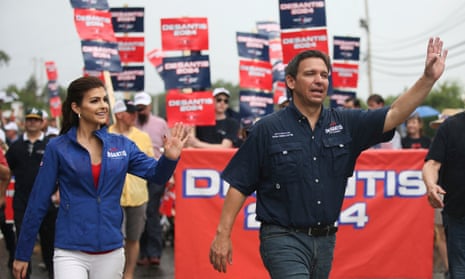 Ron DeSantis and wife Casey waving at supporters
