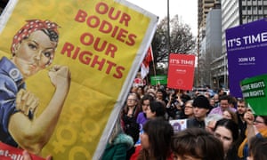 Pro-choice advocates and supporters of a bill to decriminalise abortion hold a rally outside the NSW parliament in Sydney on Wednesday.
