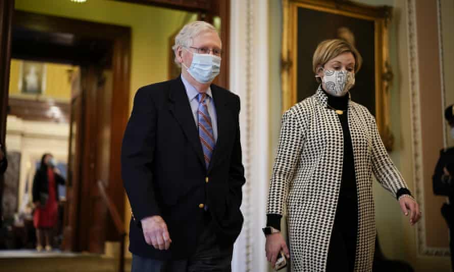 Mitch McConnell walks on Capitol Hill as the Senate works to complete the Democrats’ $1.9tn Covid relief bill.