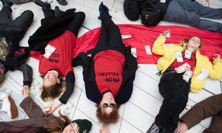 Nan Goldin with protesters at the V&A’s Sackler Centre