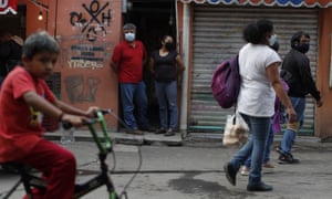 People wearing masks in San Gregorio Atlapulco in Mexico City.