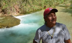 Havasupai tribal council vice-chairman Ed Tilousi next to the creek in Supai Village.