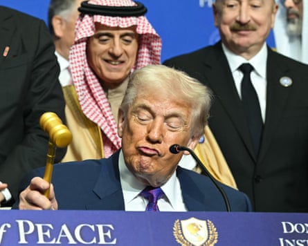 Donald Trump raises a gavel