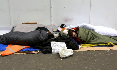 People sleeping outside a tube station in central London