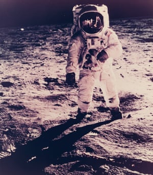 Neil Armstrong is reflected in Aldrin’s helmet visor