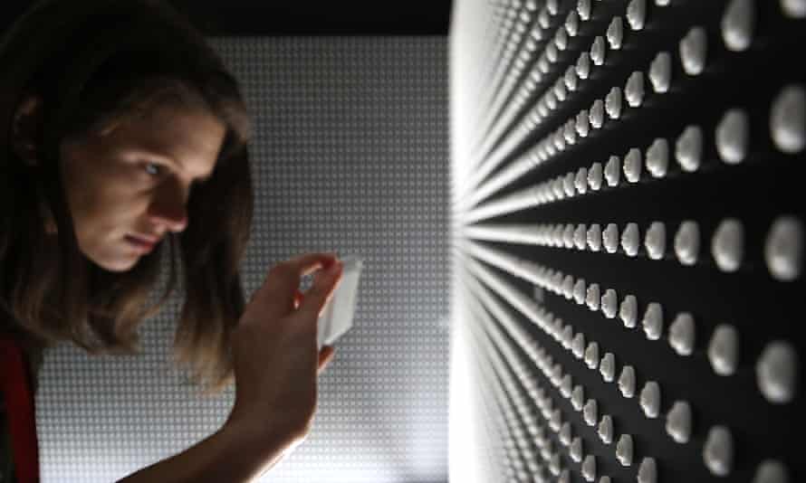 A memorial in Washington DC, consisting of 22,000 engraved white pills representing the face of someone lost to a prescription opioid overdose in 2015.