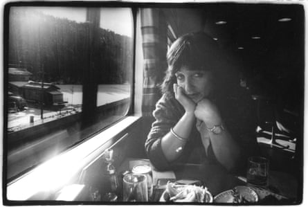 The right profile … Smith on a bullet train in Japan, photographed by Strummer.