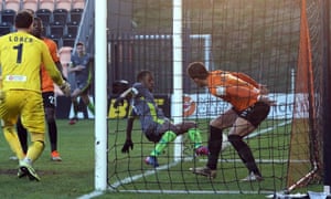 Simeon Cobourne scores Halesowen’s winner in the FA Trophy at Barnet.