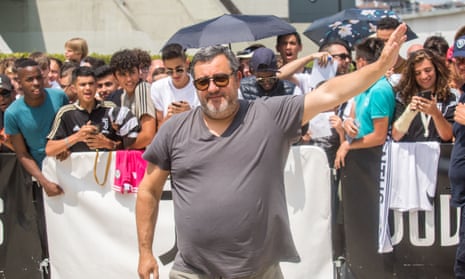 Mino Raiola listens to the chants of the Juventus fans in 2019.