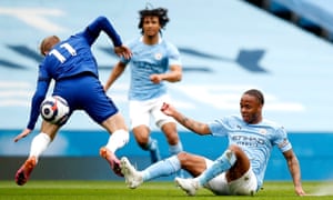 Manchester City’s Raheem Sterling (right) fouls Chelsea’s Timo Werner and goes into the book.