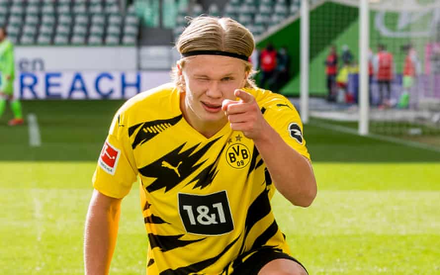 Erling Haaland celebrates one of his two goals against Wolfsburg.