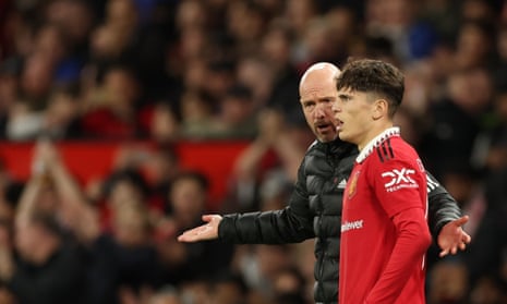 Erik ten Hag conveys instructions to Alejandro Garnacho on the sidelines