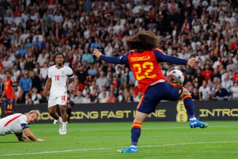 Harry Kane's header comes off the thigh of Spain's Marc Cucurella on its way into the net for England's second goal.