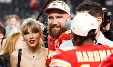 Travis Kelce (centre) and Taylor Swift (left) celebrate the Chiefs’ victory.
