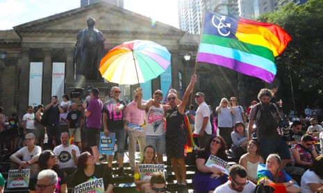 People gather in front of the State library of Victoria for the outcome of the same-sex marriage postal survey, Melbourne, Wednesday, November 15, 2017. The Australian Bureau of Statistics will announce the results of the same-sex marriage postal survey today. (AAP Image/David Crosling) NO ARCHIVING