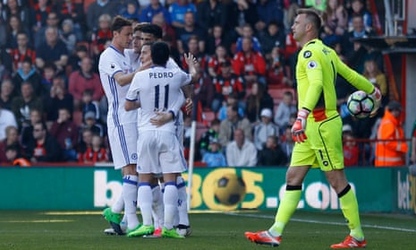 Eden Hazard takes the congratulations of his Chelsea team-mates after Chelsea’s typically ruthless second goal past Artur Boruc in the leaders’ victory at Bournemouth.