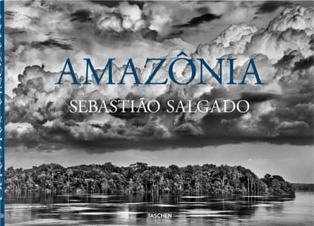 The cover of Amazônia which shows water, forest and sky full of clouds