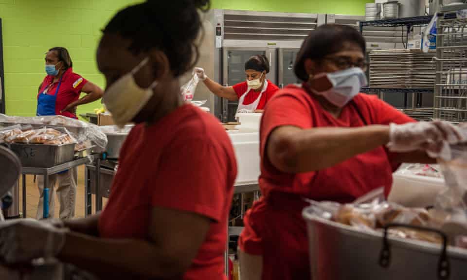 Cafeteria staff members prep delivery meals at William Dean Jr elementary school in Lexington, Mississippi, on 1 April.