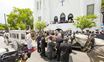 The casket of shooting victim Susie Jackson is brought into the Mother Emanuel AME church.