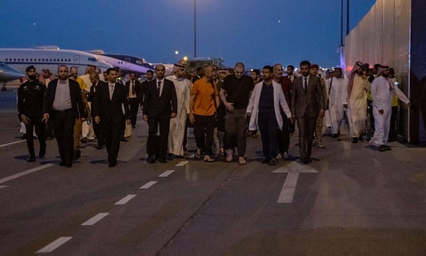 Prisoners of war who had been released after the intervention of the Saudi crown prince, Mohammed bin Salman, arriving in Riyadh from Russia