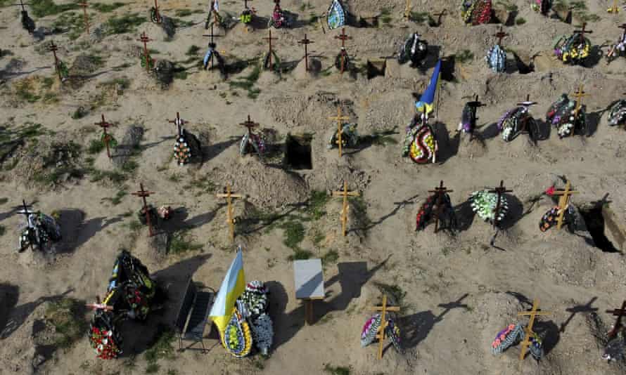 Tombs of people who died after Russia invasion are seen in Bucha cemetery, outskirts of Kyiv, Ukraine.