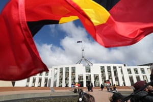 Aboriginal flag with Parliament House in the background at an event to welcome Clinton Pryor attended by opposition leader Bill Shorten after Clinton completed his 5581km walk for justice from Perth.